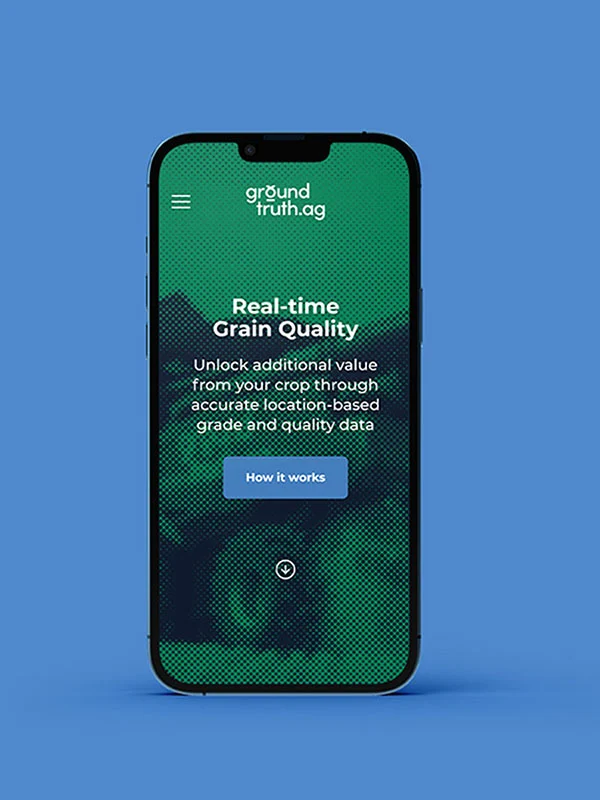 Smartphone mockup displaying the Ground Truth.ag website hero section with the headline 