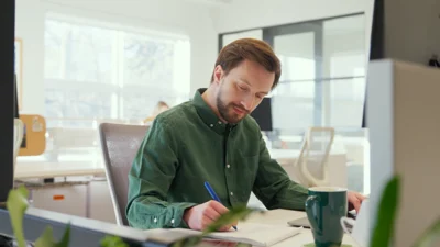 Ascent-strategy-office-james-working