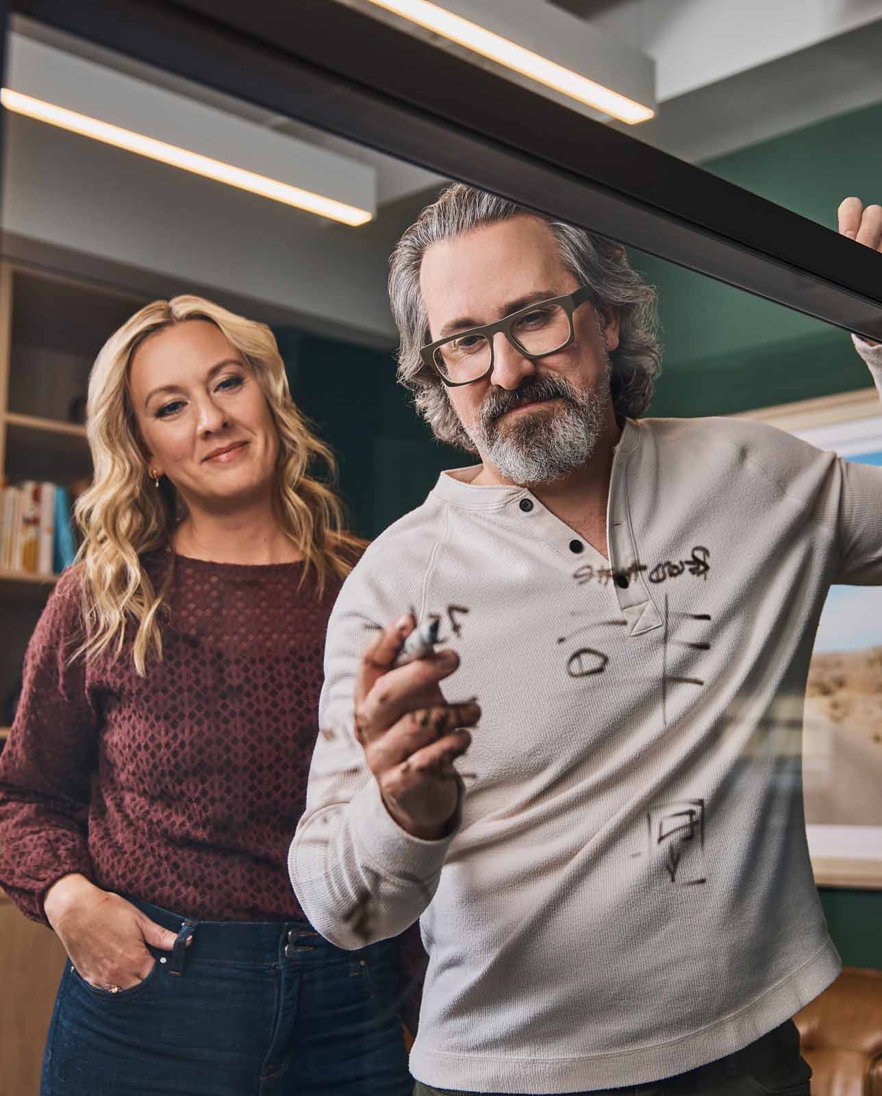 Jeff and Nicole strategy session in Ascent Office