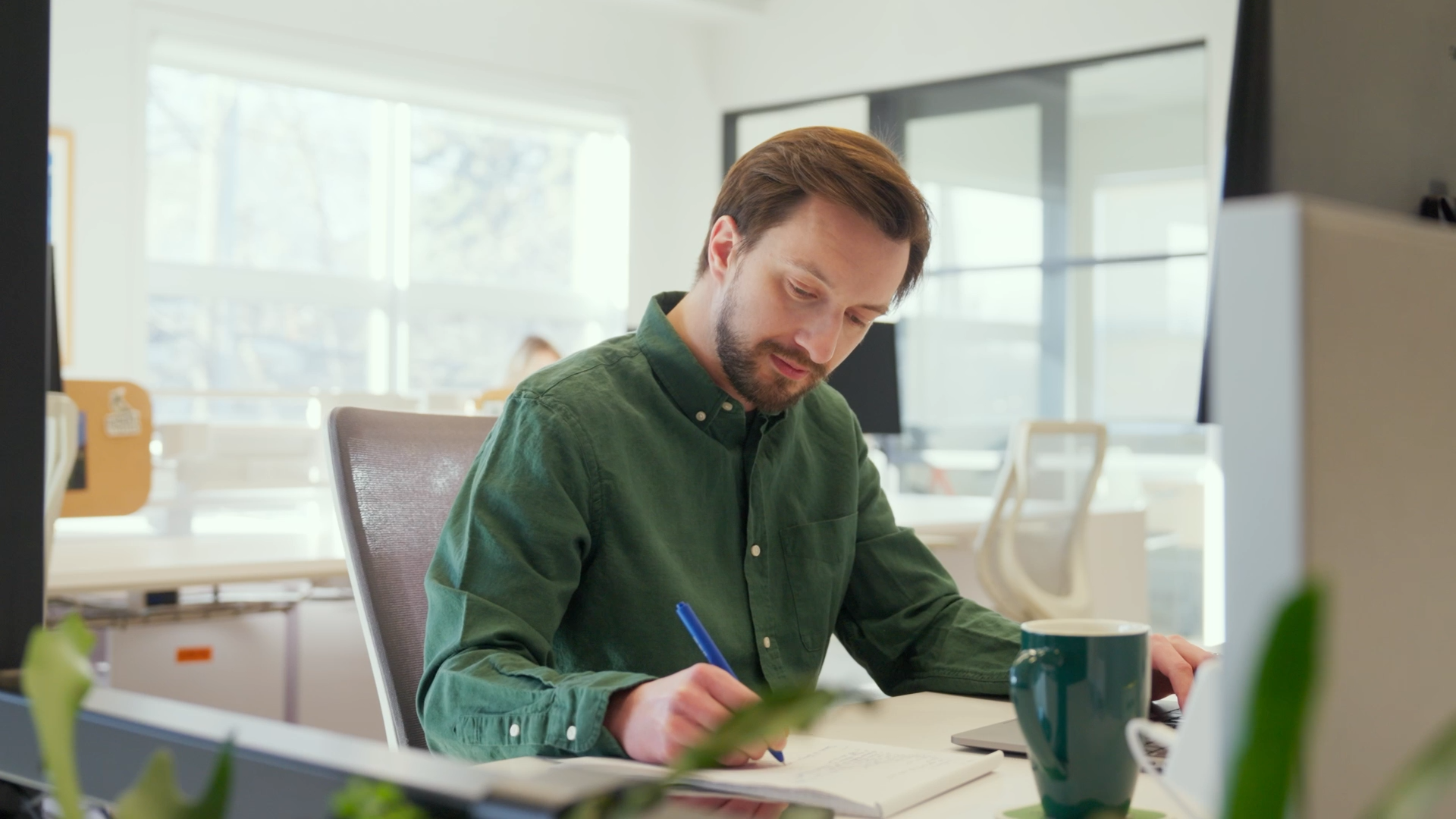 Ascent-strategy-office-james-working